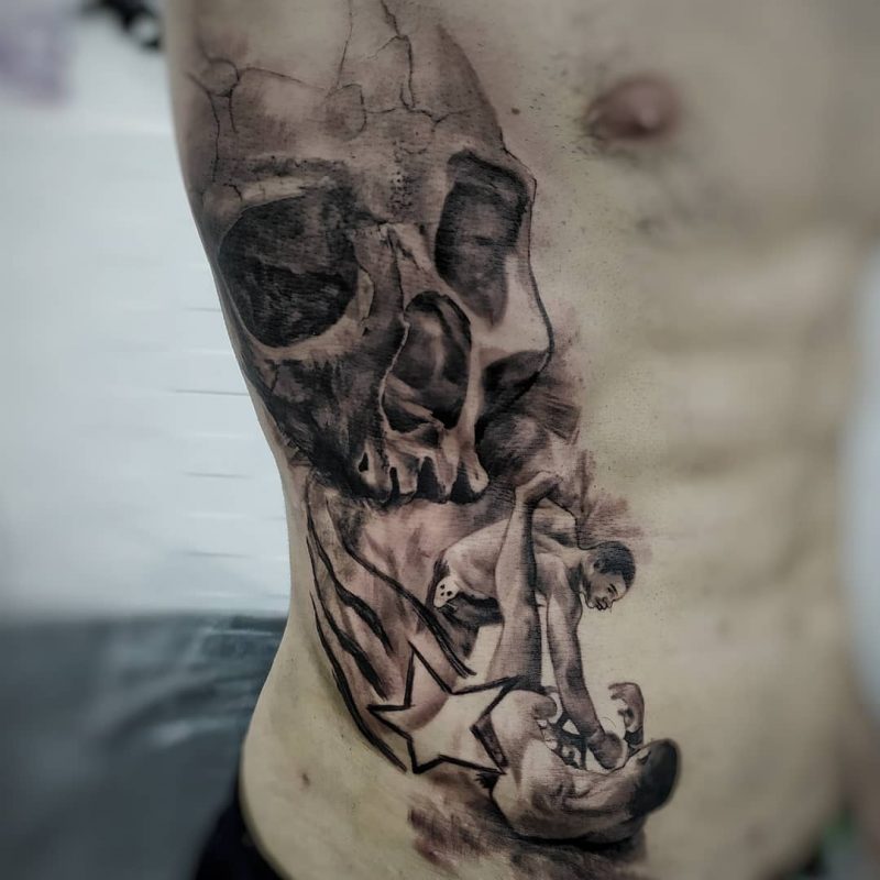 Tatuajes de Artes Marciales Mixtas (MMA) 12 Golpeando a tu rival en el Ground And Pound...