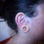 tattoo en la oreja
