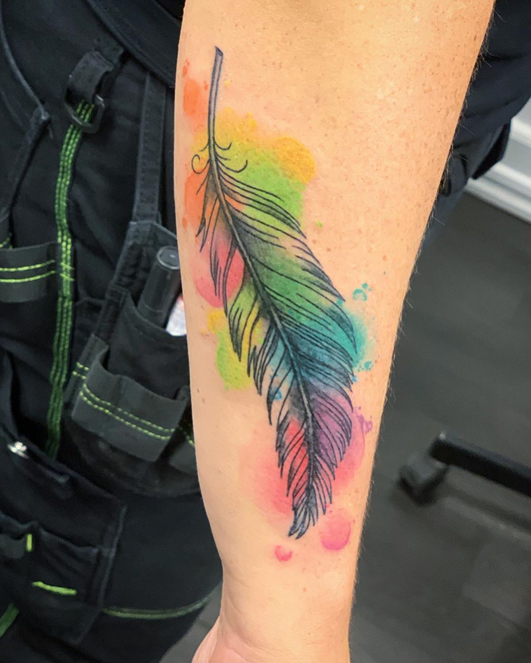 25 Impressive Feather Tattoo Designs  Blurmark  Feather tattoo design Rainbow  tattoos Shape tattoo