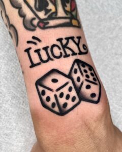 Dice Tattoos: Meanings and Unique Designs 2 dice tattoos
